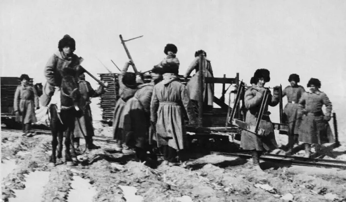 Framed Print : Russian army engineers seen here laying a track bed for a narrow gauge railway during Framed Print : Russian army engineers seen here laying a track bed for a narrow gauge railway during