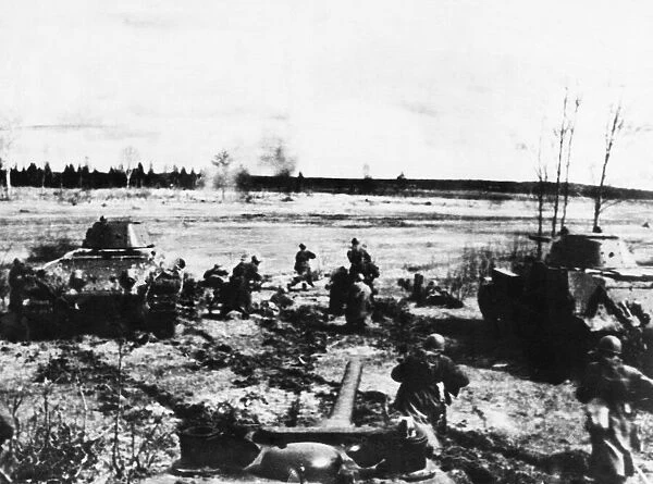 Russian infantry and tanks advance. (Picture) Tanks having blasted the German