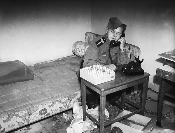 Russian officer making a phone call in the ruins of the Reich Chancellery, Berlin
