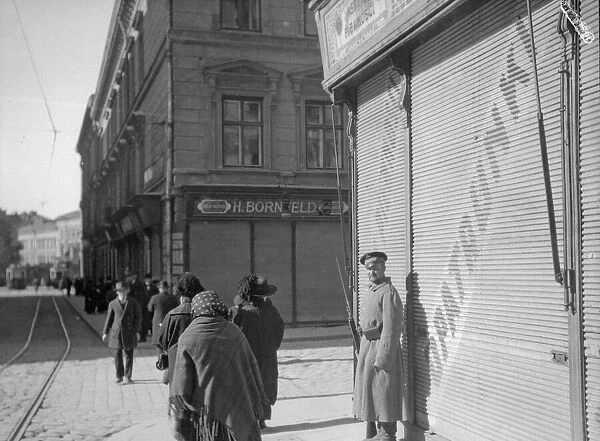 Russian sentry seen here posted to guard a shop in Lemberg following the Russian invasion