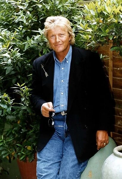 Rutger Hauer actor stands in garden