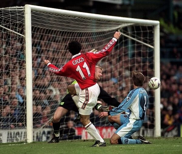 Ryan Giggs of Manchester United scores his goal Feb 1999