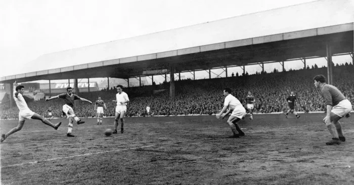 Framed Print : s Brian Walsh sends in a low drive which puts the visitors three goals up at the Vetch