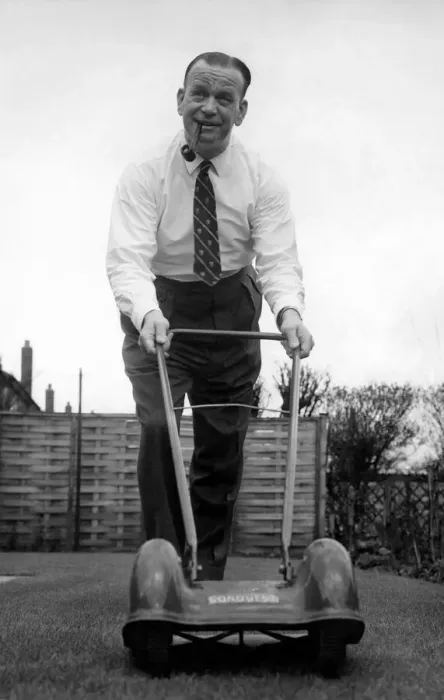 Framed Print : Sacked Manchester City manager George Poyser pictured doing a spot of gardening at his Framed Print : Sacked Manchester City manager George Poyser pictured doing a spot of gardening at his