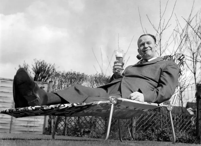 Framed Print : Sacked Manchester City manager George Poyser relaxes in the sunshine with a glass of beer Framed Print : Sacked Manchester City manager George Poyser relaxes in the sunshine with a glass of beer