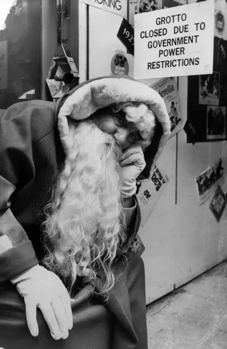 Framed Print : A saddened Father Christmas at David Morgans store in Cardiff