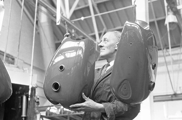 Saddle tanks for BSA motorcycles on the production line at the BSA Factory, Small Heath