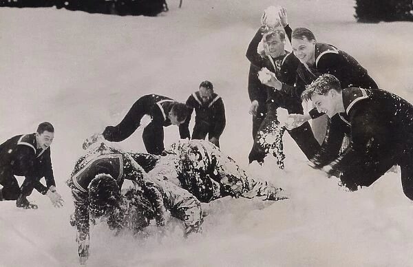 Sailors playing in the snow