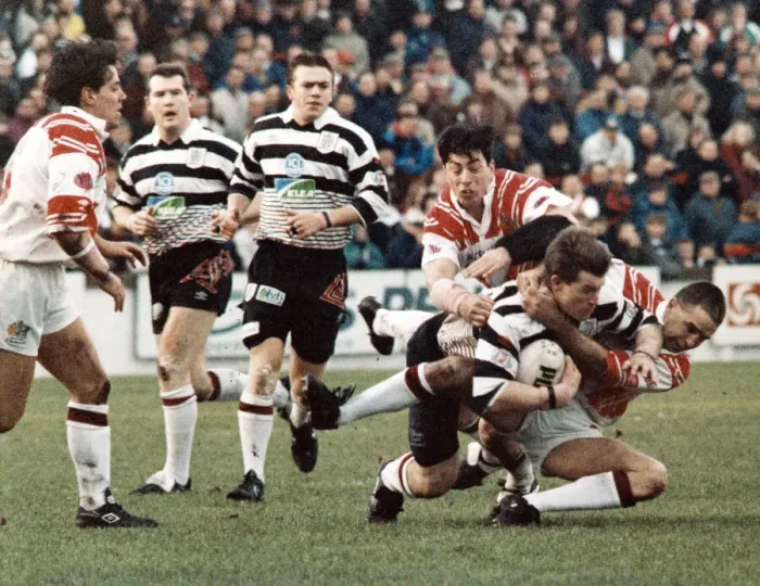 Framed Print : Saints v Widnes Rugby match - John Devereaux well taken out by Paul Loughlin