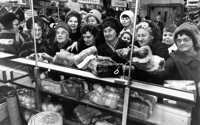 Framed Print : The sales rush is on and eager housewives crowd around the counter in a Liverpool store