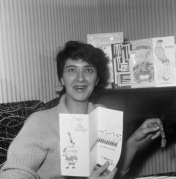 Salford born playwright Shelagh Delaney pictured opening 21st birthday cards at her home