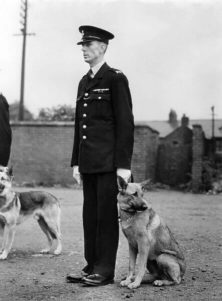 Salford City Police inspection. Police Constable Shaw with Police-dog Lady Peggy
