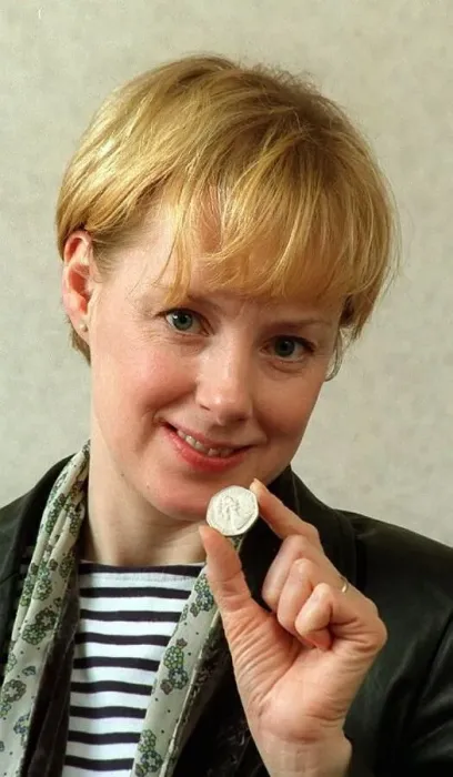 : Sally Whittaker and May 1998 Coronation Street actress holding an old 50p : Sally Whittaker and May 1998 Coronation Street actress holding an old 50p