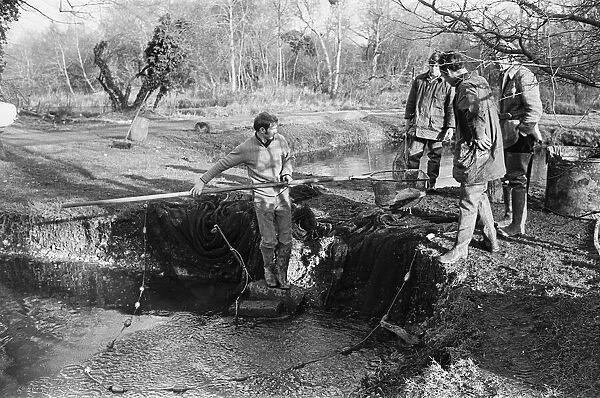 Sam Holland (far right) and trout farmers. 13th February 1976