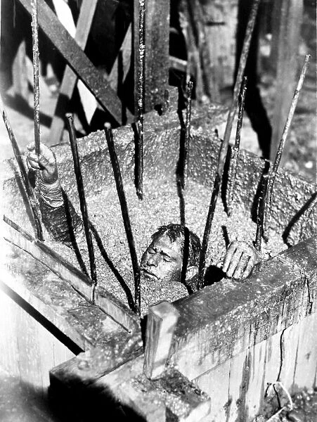 Sam Wanamaker buried in liquid concrete for the filming of 'Give Us This Day'