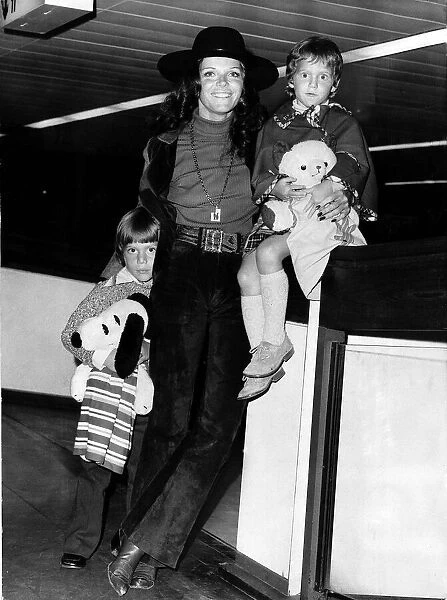 Samantha Eggar actress with her children Nicholas and Jenna arriving at Heathrow