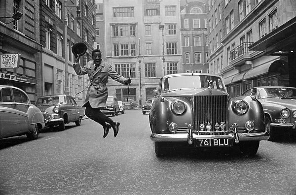 Sammy Davis Jnr. in London with his new Rolls Royce. 31st March 1963