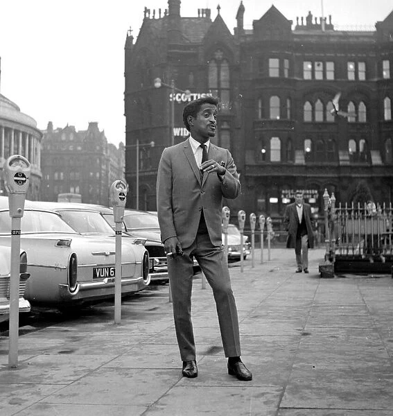 Sammy Davis Jnr outside Piccadilly station, Manchester. 9th October 1961