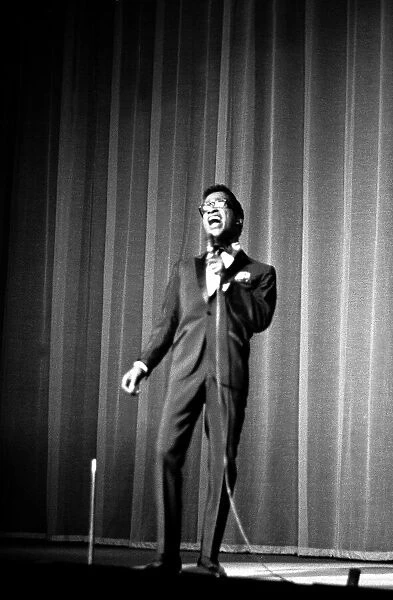 Sammy Davis Jnr performing on stage at the Prince of Wales August 1961