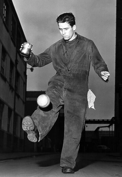 Sammy Reid playing football at work January 1967