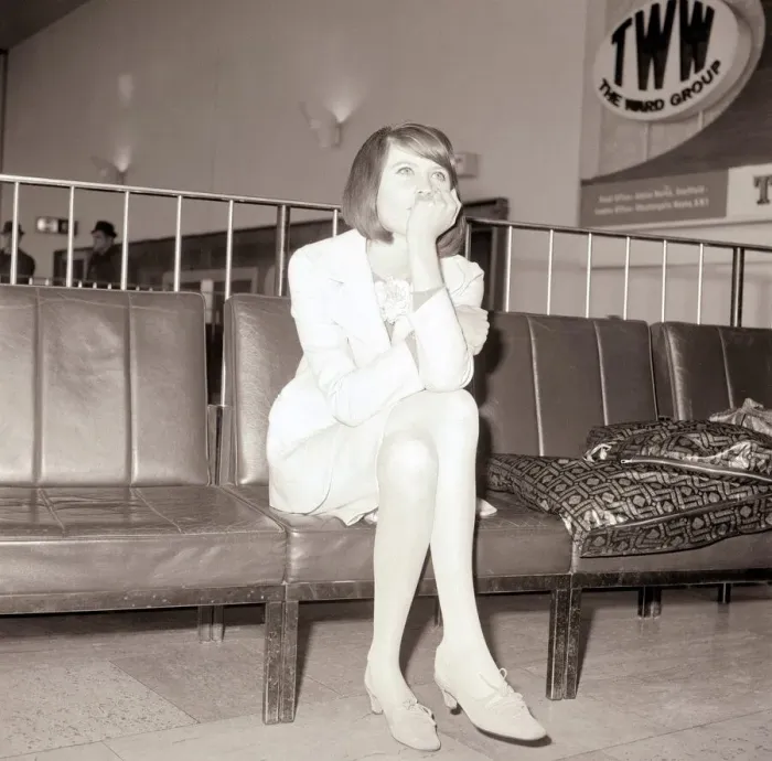 Framed Print : Sandie Shaw on her 19th birthday in a pink suit at London Airport bound for Paris to