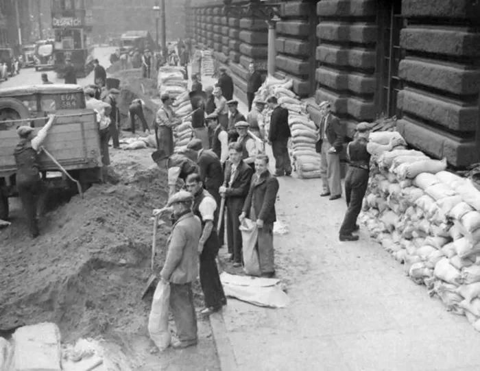  : Sandpacking, Filling sandbags in Birmingham city centre in the months
