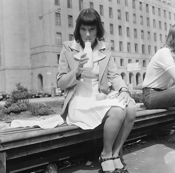 Sandwich Feature, Manchester, 21st August 1974. Young woman takes a lunch break