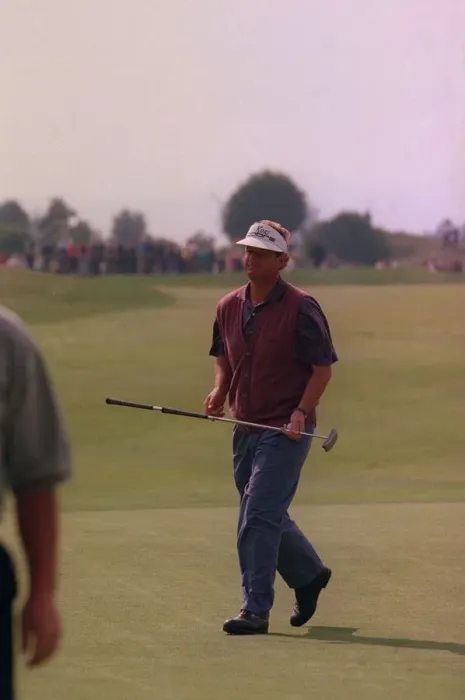 Framed Print : Sandy Lyle golfer on green carrying putter wearing skip cap at Gleneagles golf course