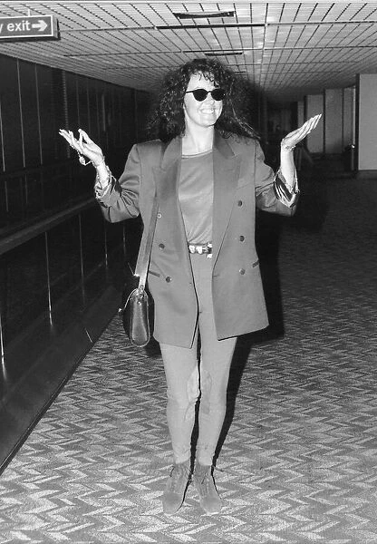 Sarah Brightman Actress and Dancer Arriving at Heathrow Airport Wearing Sunglasses