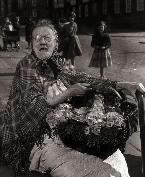 Sarah Burke aged 78 Flower Seller - February 1961 sells flowers on the streets of