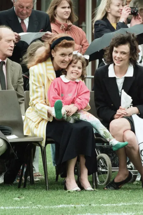 Framed Print : Sarah, Duchess of York and Princess Eugenie watching sports day at Upton House School Framed Print : Sarah, Duchess of York and Princess Eugenie watching sports day at Upton House School