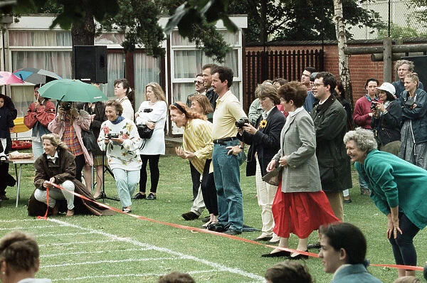 Sarah, Duchess of York watching Princess Beatrice during sports day at Upton House School