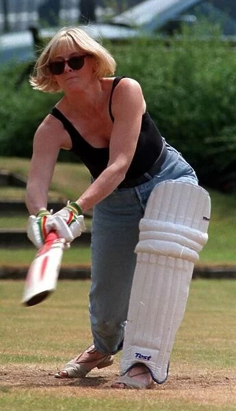 Sarah Lancashire actress playing a game of cricket during break from playing Raquel in