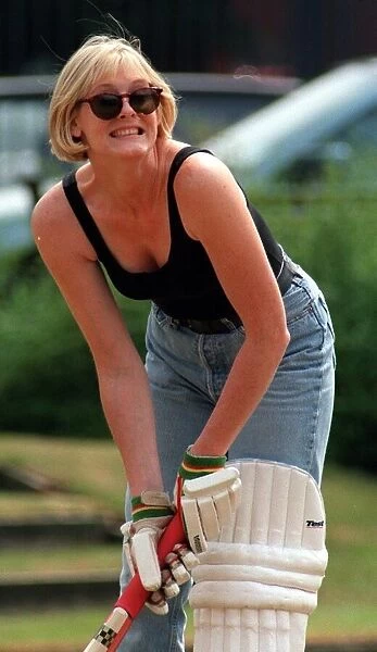 Sarah Lancashire playing a game of cricket during break from playing Raquel in Coronation