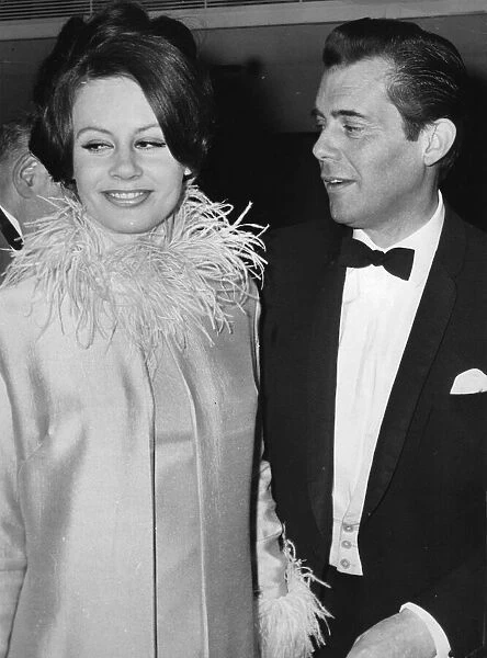 Sarah Miles and Dirk Bogarde at film premiere - April 1964