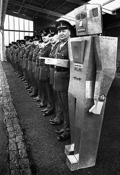 Sargeant Majors lining up with robot on the end. March 1968 P005713