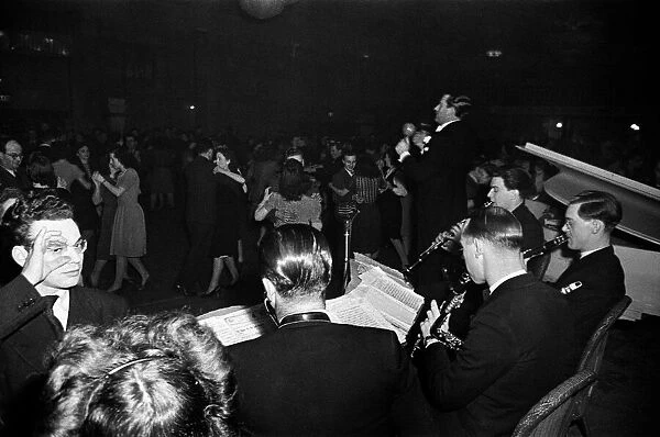 Saturday night dancing at Hammersmith Palais in London, with a band supplying the music