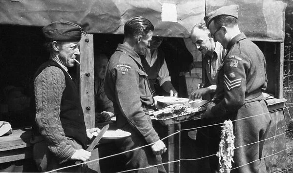 Scene at the cook house at the Reading Home Guard camp in Berkshire during the Second