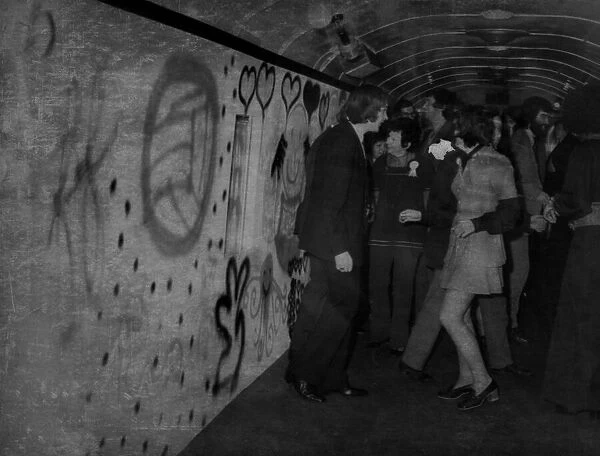 A scene inside football fans special disco train on 9th April 1975