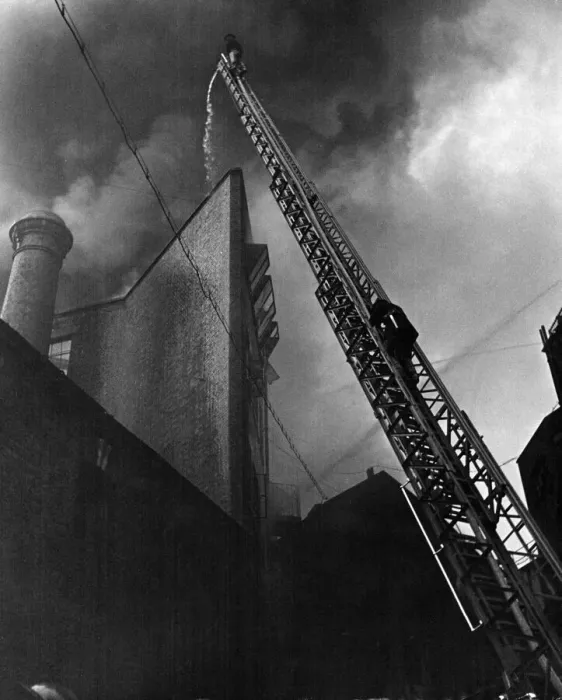 Framed Print : Scene from the London areas biggest yet buzz bomb fire when a warehouse Framed Print : Scene from the London areas biggest yet buzz bomb fire when a warehouse