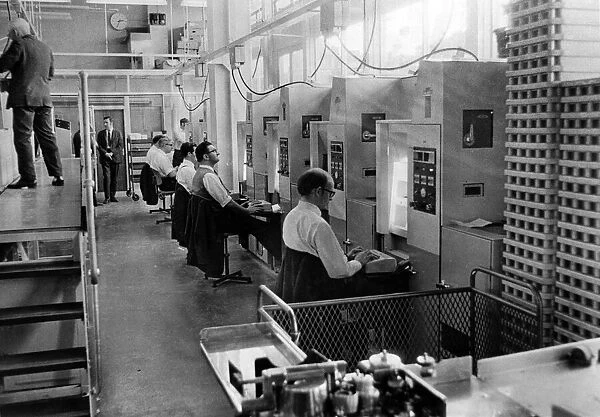 The scene at Newport Sorting Office, showing rows of coding machines and their operators