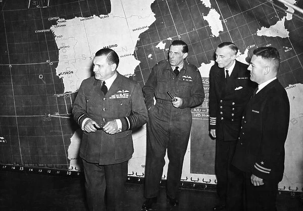 The scene in R. A. F. Coastal Command Headquarters Operation Room as Air Chief Marshal Sir