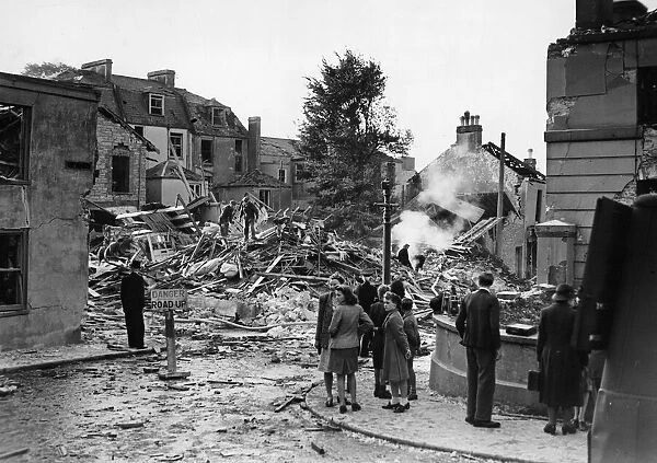 Scene showing a destroyed residential street in the city of Plymouth following an air