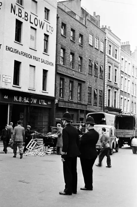 Framed Print : Scenes at Covent Garden, central London on the corner of Wellington Street with two Framed Print : Scenes at Covent Garden, central London on the corner of Wellington Street with two