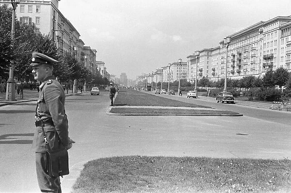 Scenes in East Berlin, East Germany soon after the start of the construction of