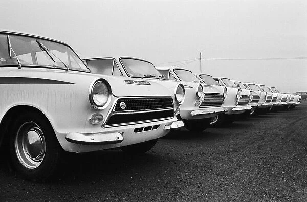 Scenes at the Ford motor factory in Dagenham, Essex showing cars parked outside