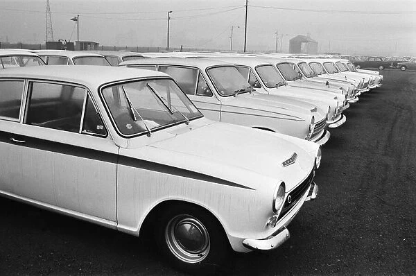 Scenes at the Ford motor factory in Dagenham, Essex showing cars parked outside