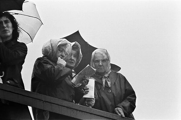Scenes at Glorious Goodwood. Spectators brave the rain. 26th July 1966