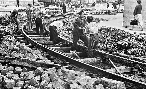 Scenes in Naples, southern Italy showing local people at work on the railway lines