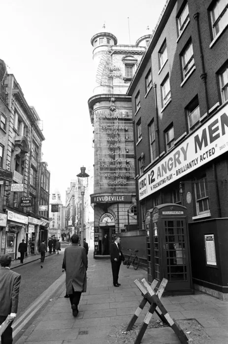 Framed Print : Scenes outside the Windmill Theatre in Soho, London after it was announced it was to
